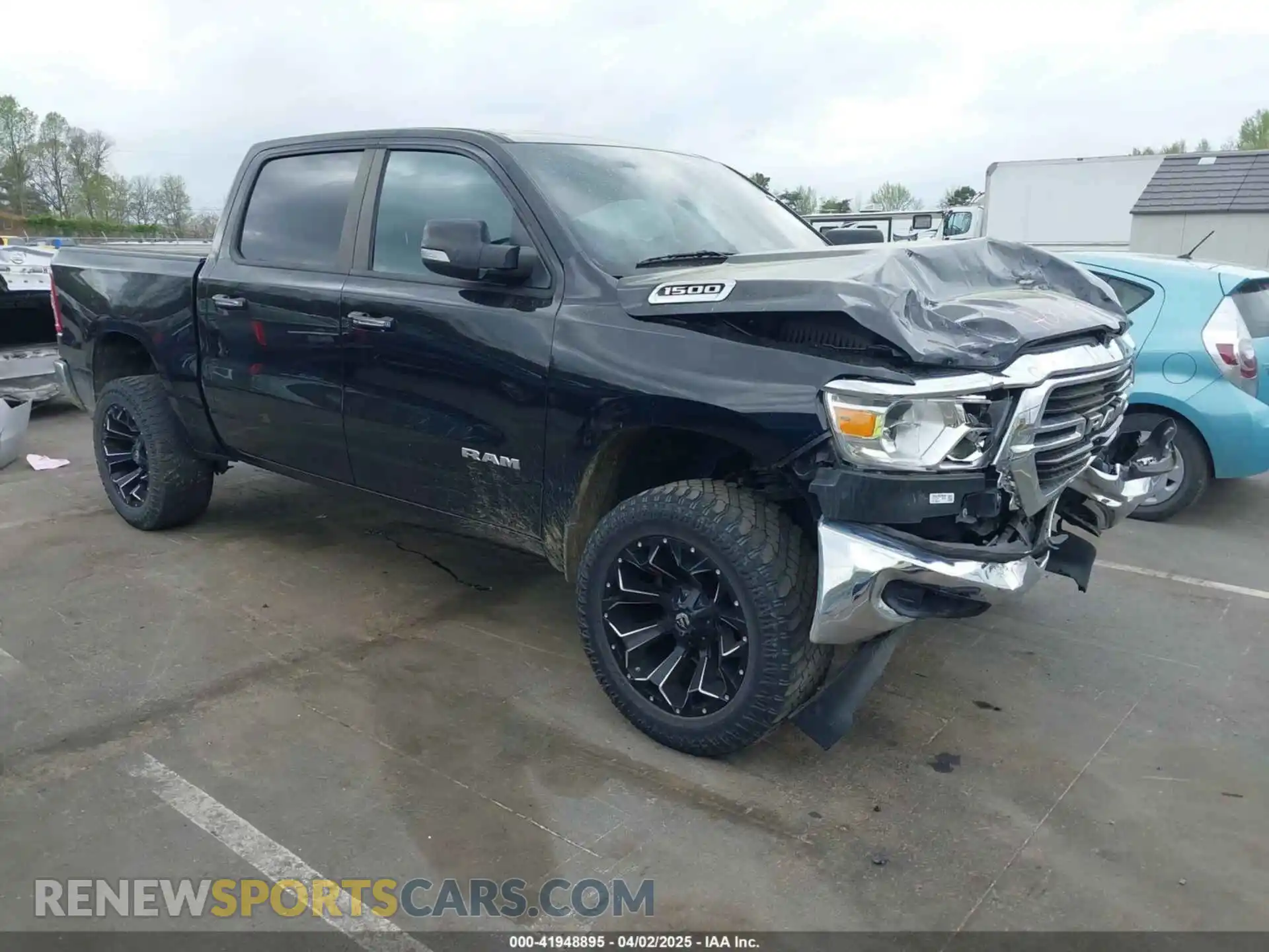 1 Photograph of a damaged car 1C6RRFFG0LN403768 RAM 1500 2020