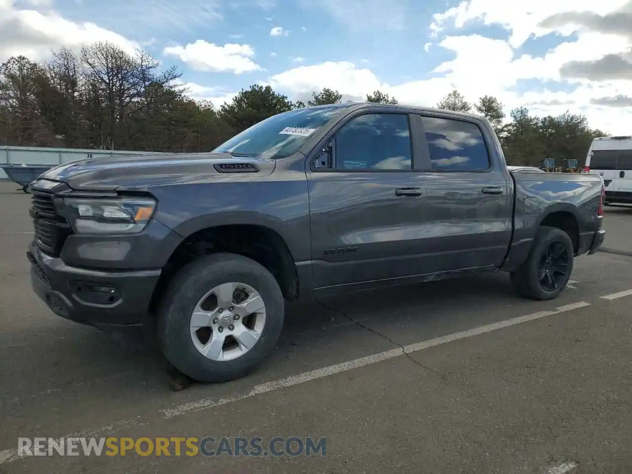 1 Photograph of a damaged car 1C6RRFFG1LN288582 RAM 1500 2020