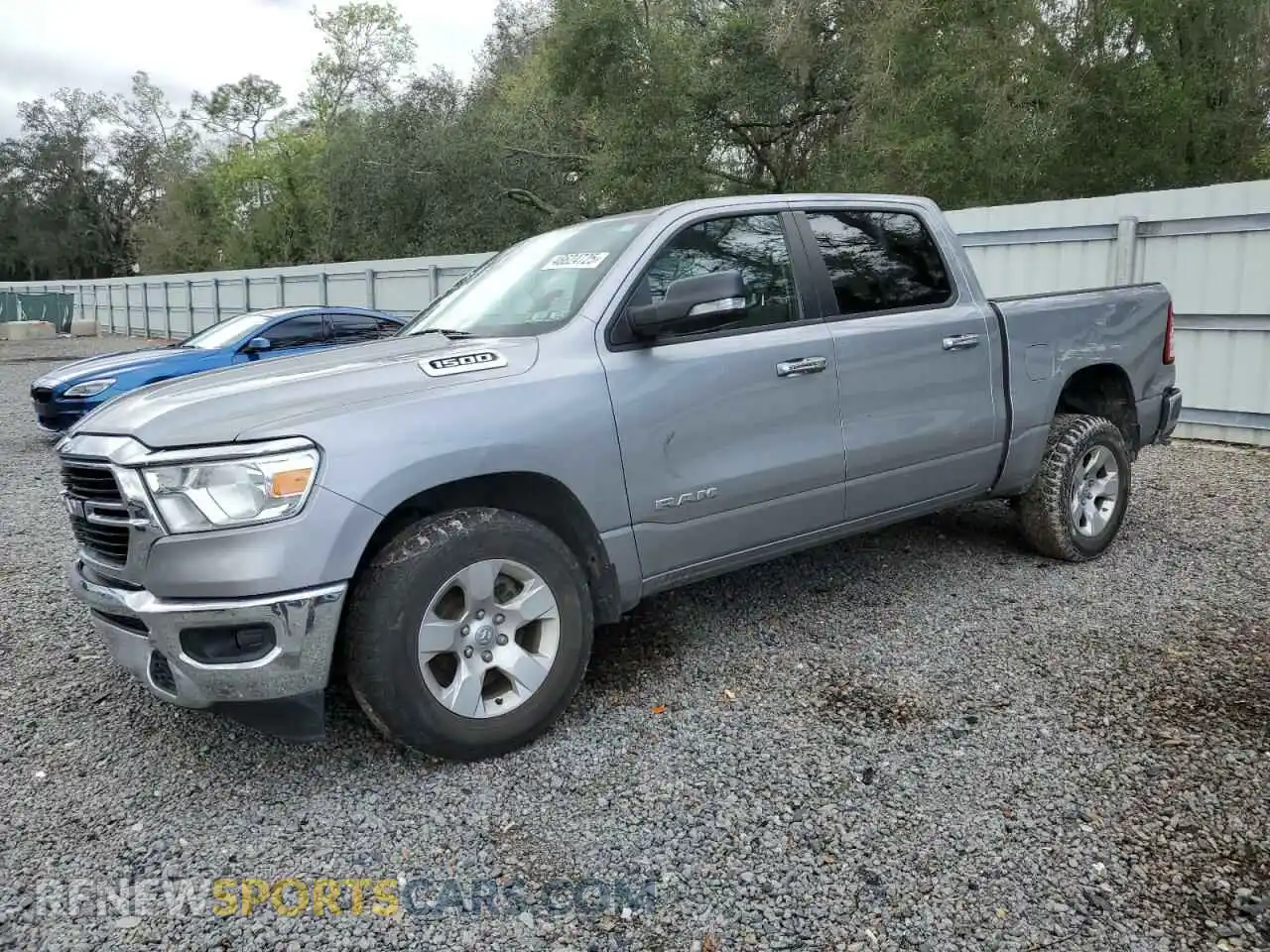 1 Photograph of a damaged car 1C6RRFFG6LN361011 RAM 1500 2020