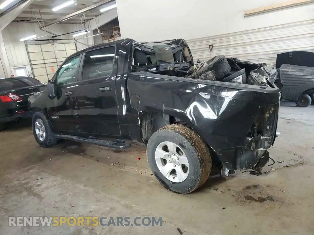 2 Photograph of a damaged car 1C6RRFGG0LN275241 RAM 1500 2020