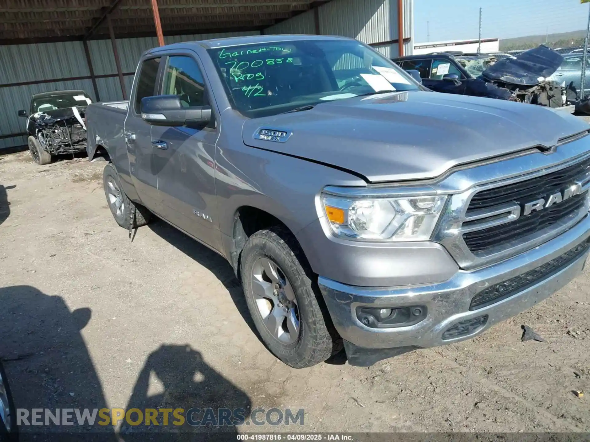 1 Photograph of a damaged car 1C6SRFBT2LN200059 RAM 1500 2020