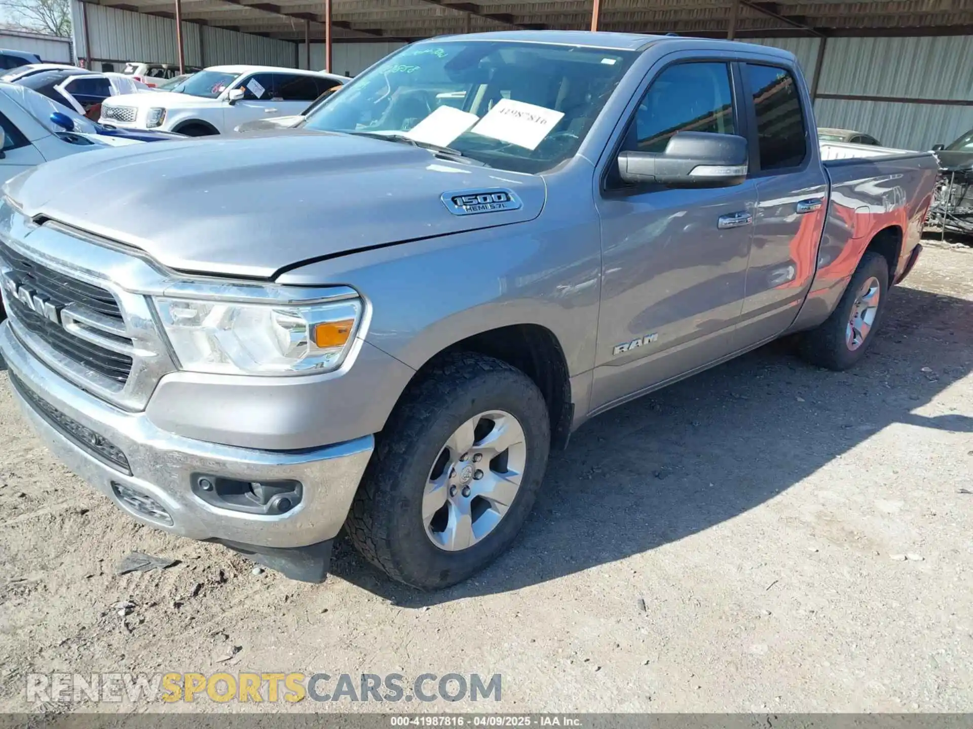 2 Photograph of a damaged car 1C6SRFBT2LN200059 RAM 1500 2020