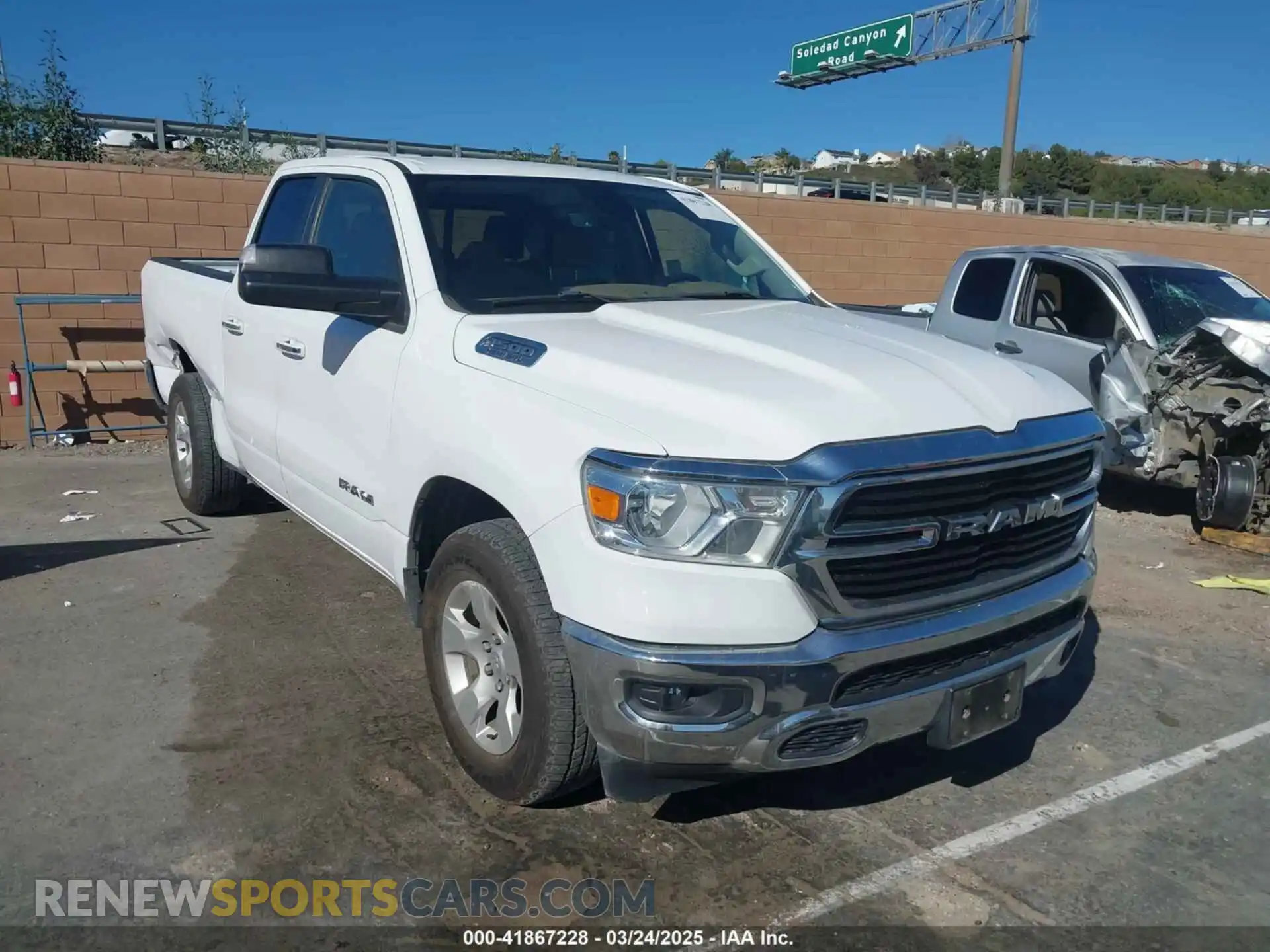 1 Photograph of a damaged car 1C6SRFBT2LN395323 RAM 1500 2020