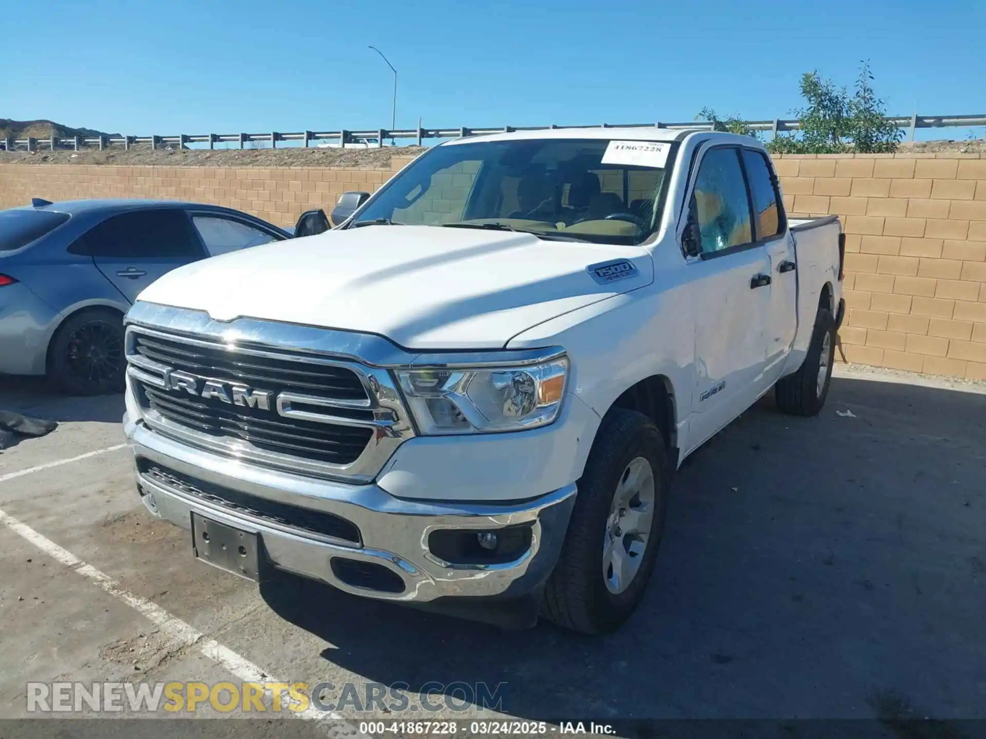 2 Photograph of a damaged car 1C6SRFBT2LN395323 RAM 1500 2020