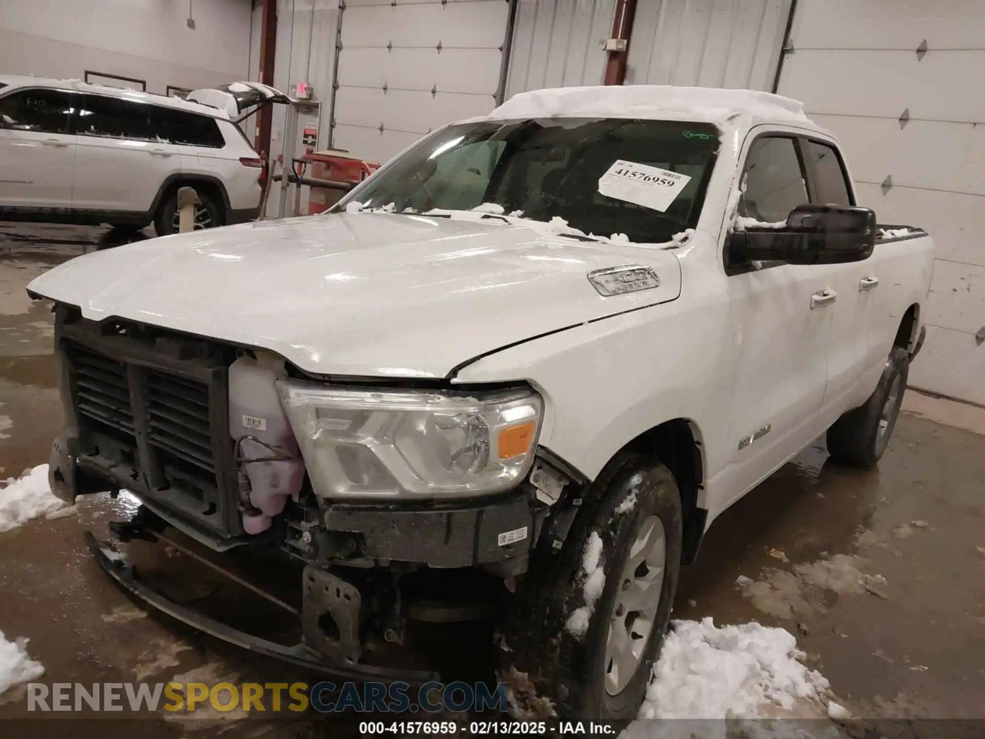 2 Photograph of a damaged car 1C6SRFBT7LN404274 RAM 1500 2020