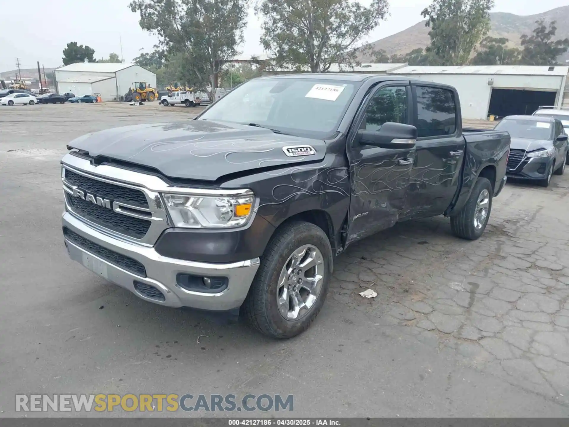 2 Photograph of a damaged car 1C6SRFFM0LN248291 RAM 1500 2020