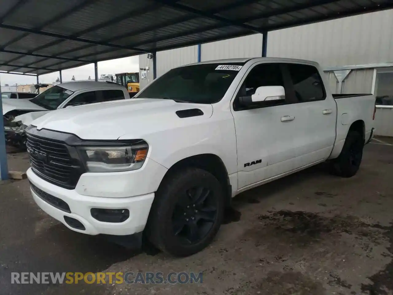 1 Photograph of a damaged car 1C6SRFFT0LN282920 RAM 1500 2020