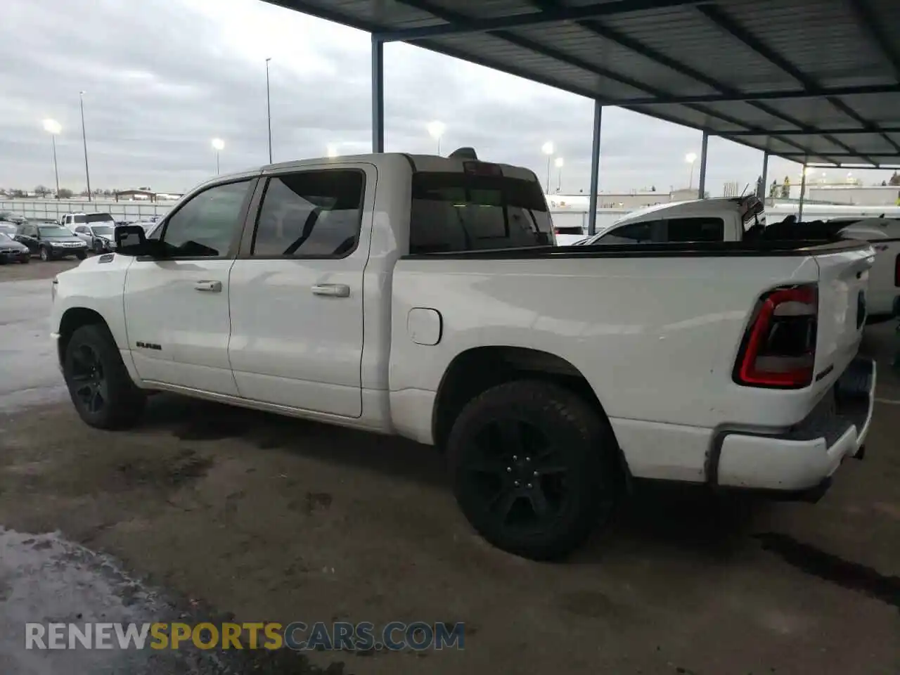 2 Photograph of a damaged car 1C6SRFFT0LN282920 RAM 1500 2020