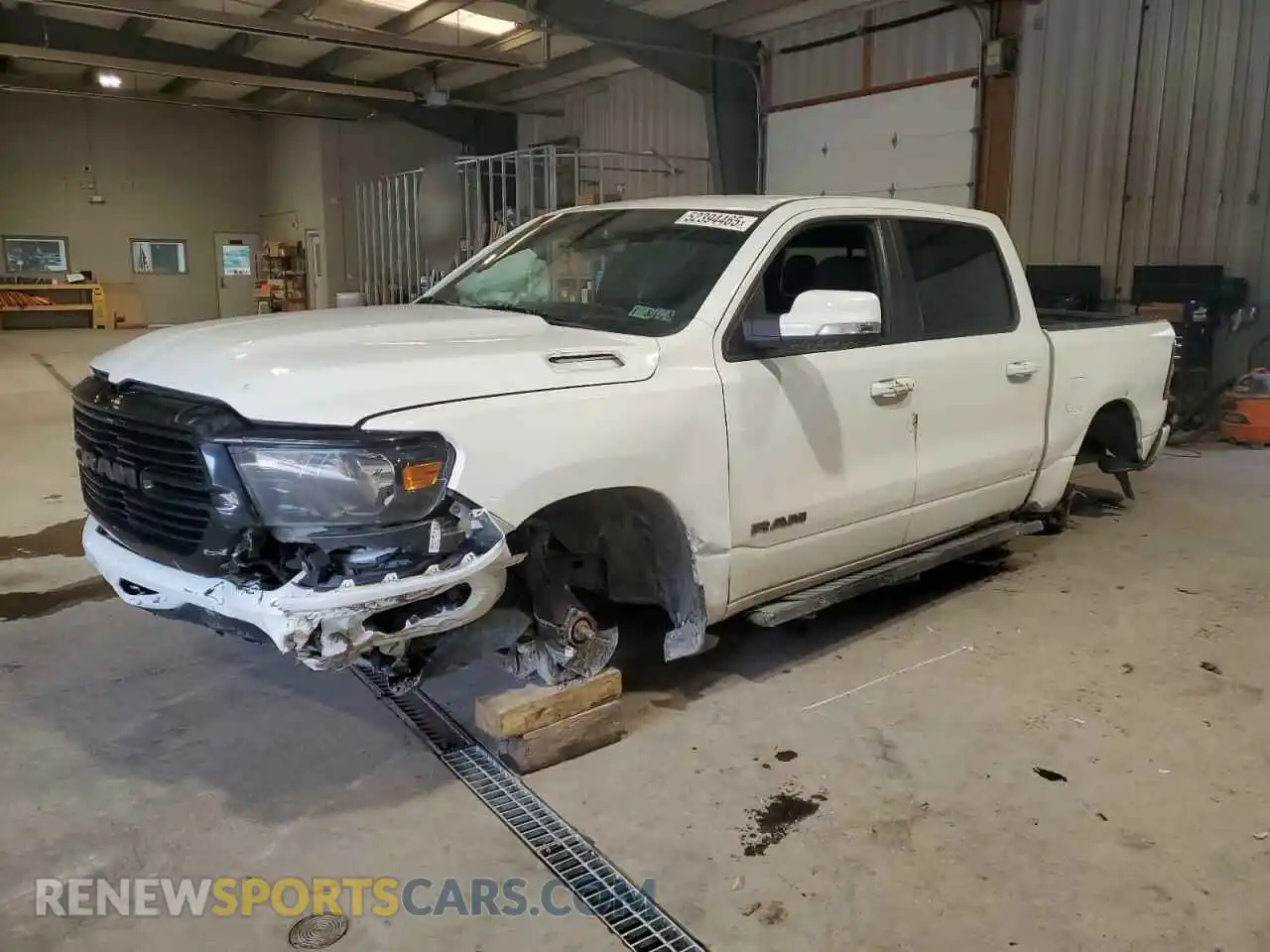 1 Photograph of a damaged car 1C6SRFFT0LN313955 RAM 1500 2020