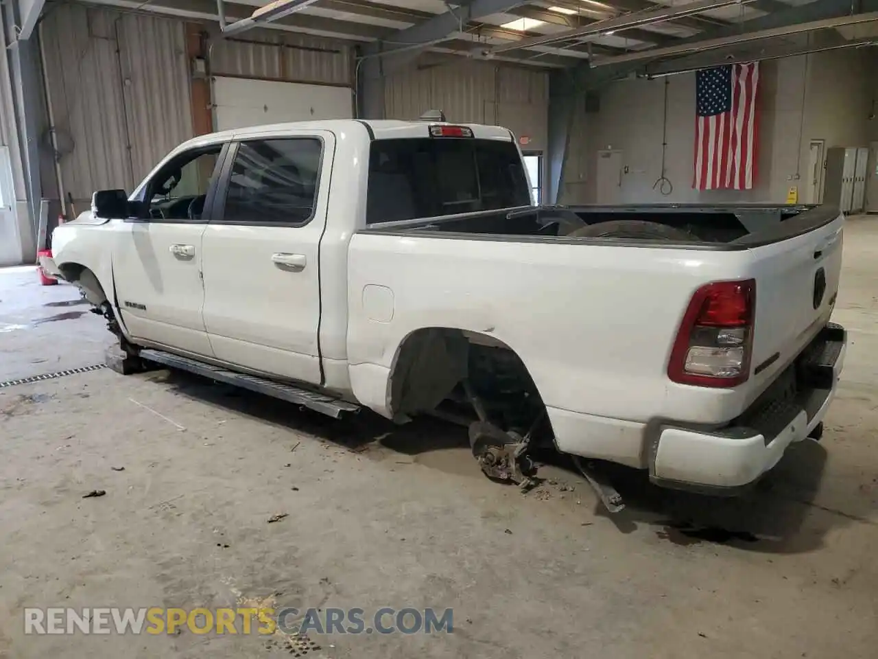 2 Photograph of a damaged car 1C6SRFFT0LN313955 RAM 1500 2020