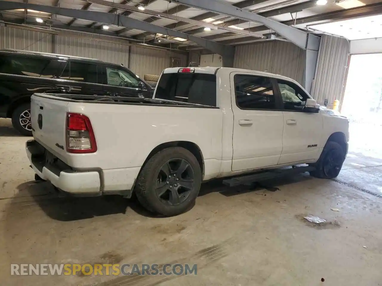 3 Photograph of a damaged car 1C6SRFFT0LN313955 RAM 1500 2020