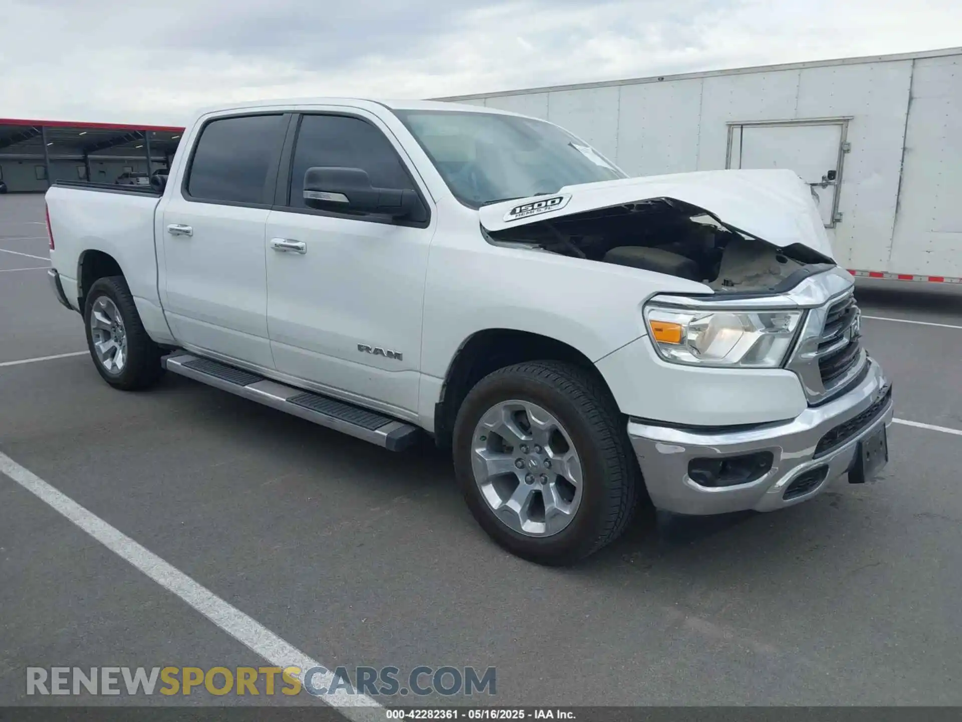 1 Photograph of a damaged car 1C6SRFFT0LN394102 RAM 1500 2020