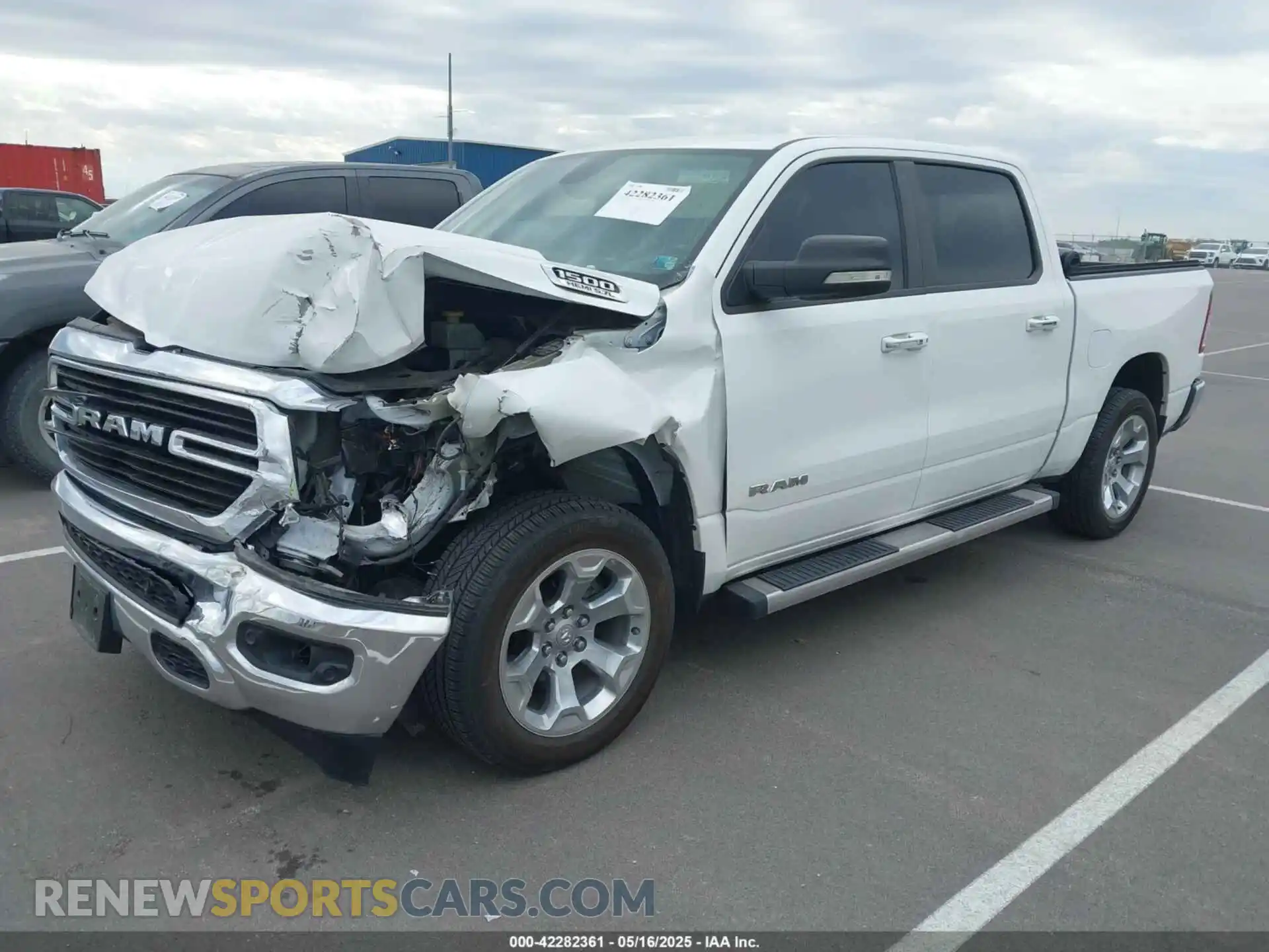 2 Photograph of a damaged car 1C6SRFFT0LN394102 RAM 1500 2020