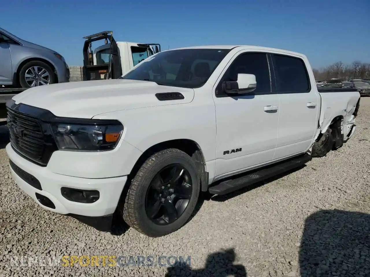 1 Photograph of a damaged car 1C6SRFFT0LN412419 RAM 1500 2020