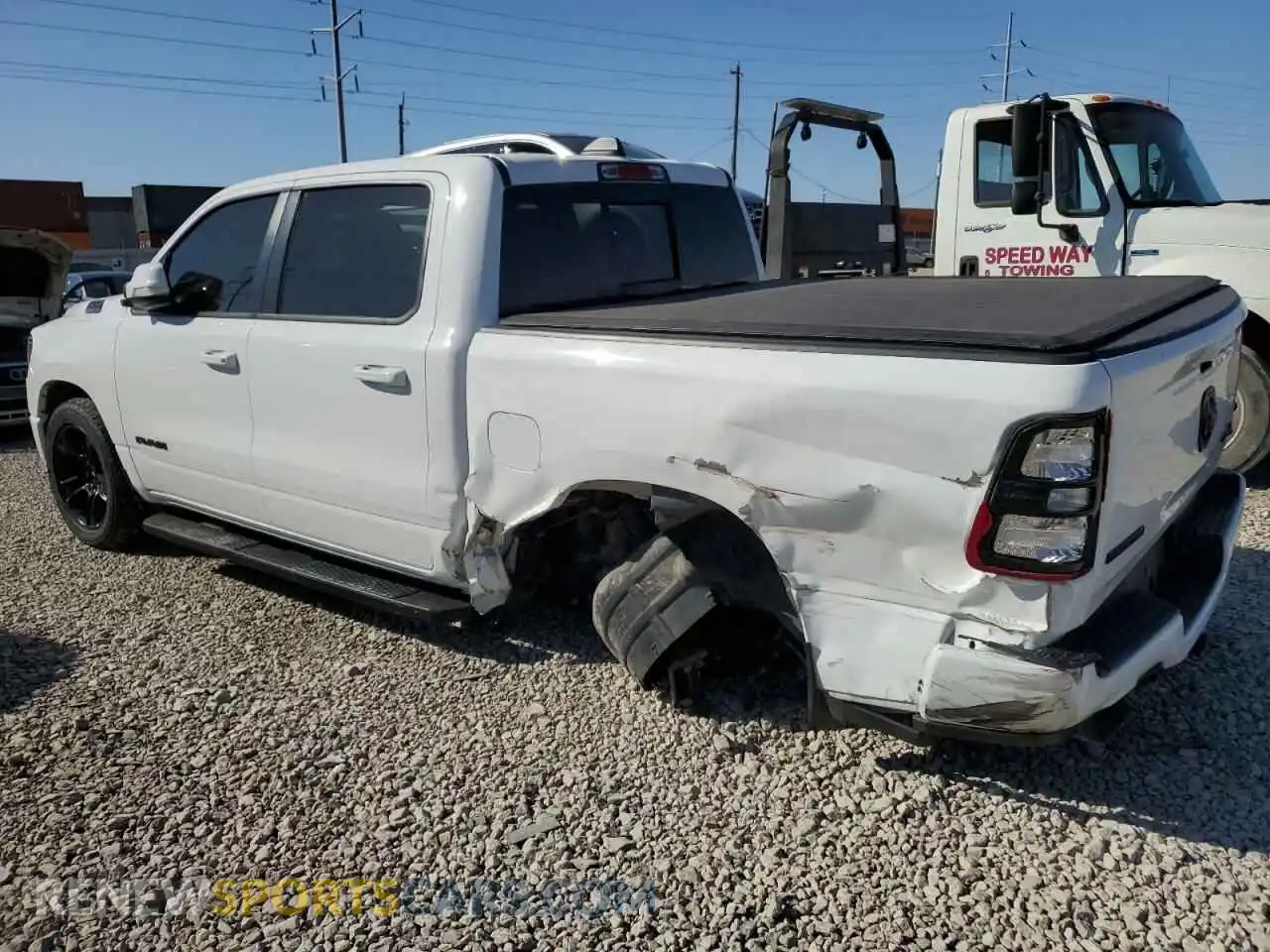 2 Photograph of a damaged car 1C6SRFFT0LN412419 RAM 1500 2020