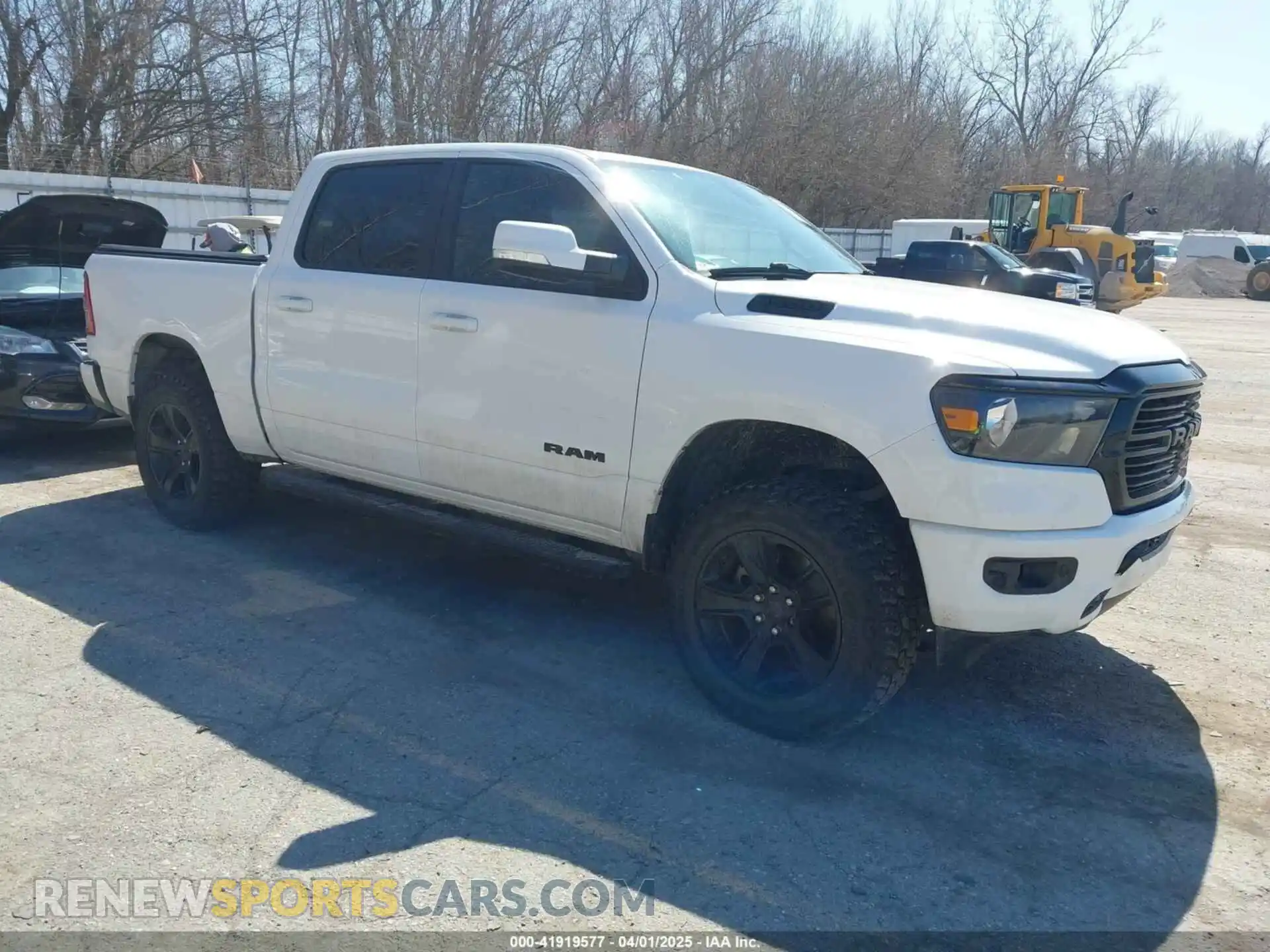1 Photograph of a damaged car 1C6SRFFT1LN103090 RAM 1500 2020