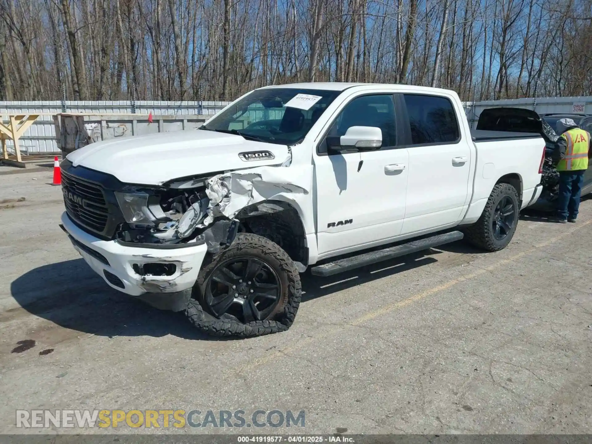 2 Photograph of a damaged car 1C6SRFFT1LN103090 RAM 1500 2020