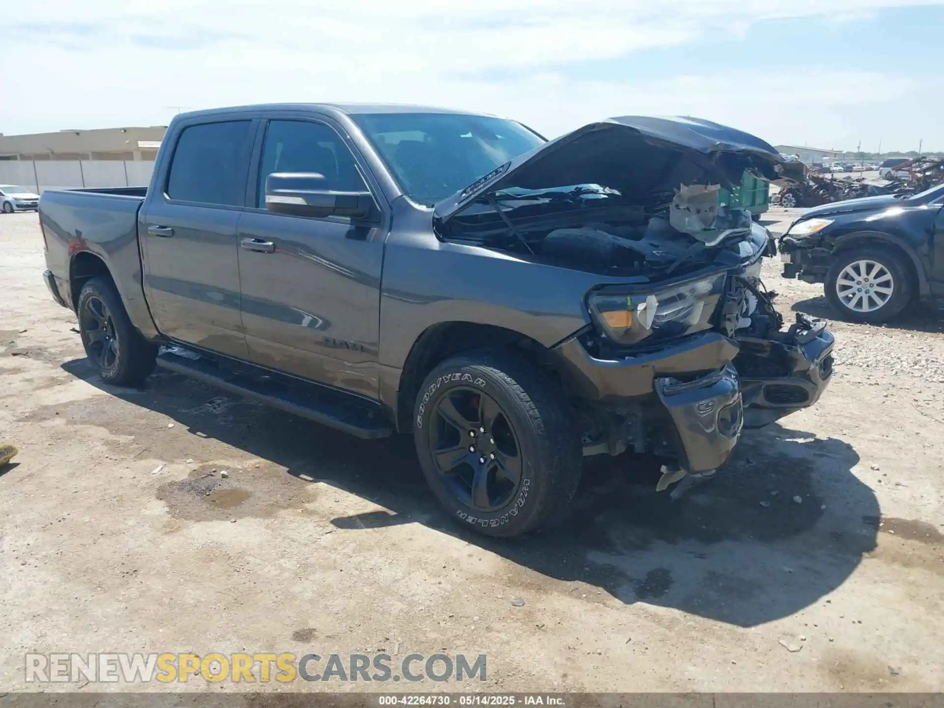 1 Photograph of a damaged car 1C6SRFFT1LN328030 RAM 1500 2020
