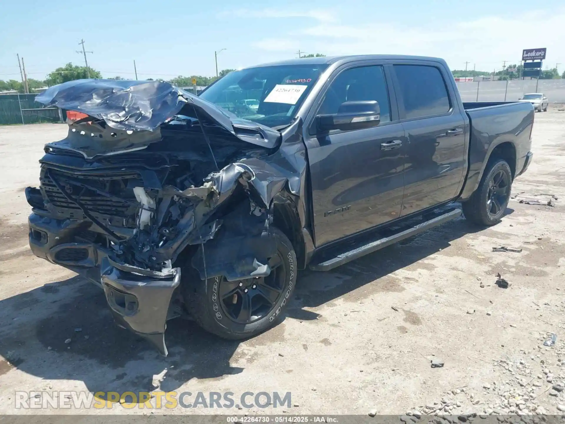 2 Photograph of a damaged car 1C6SRFFT1LN328030 RAM 1500 2020