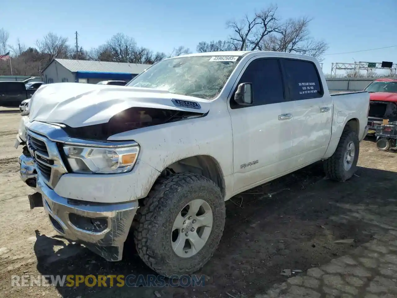 1 Photograph of a damaged car 1C6SRFFT1LN332286 RAM 1500 2020