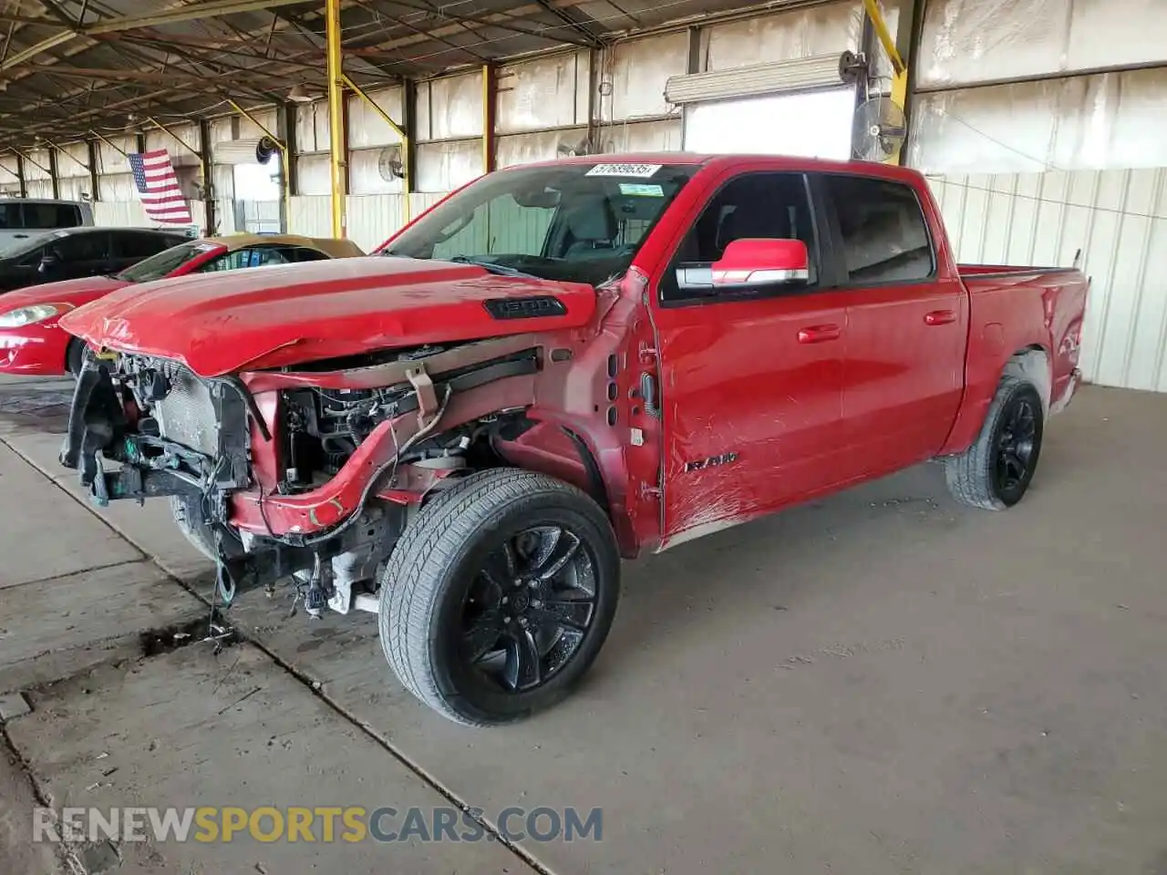 1 Photograph of a damaged car 1C6SRFFT1LN409819 RAM 1500 2020