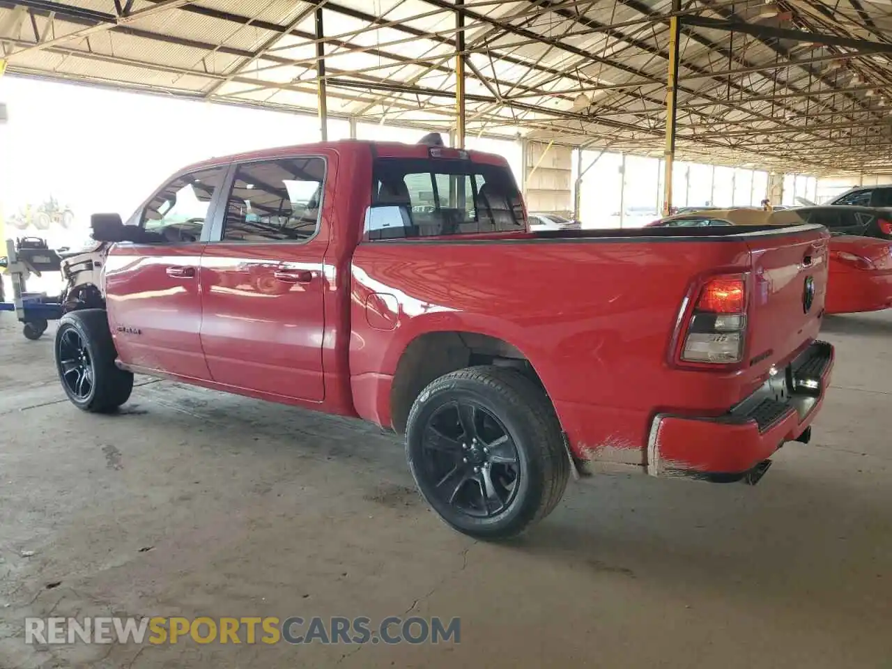 2 Photograph of a damaged car 1C6SRFFT1LN409819 RAM 1500 2020