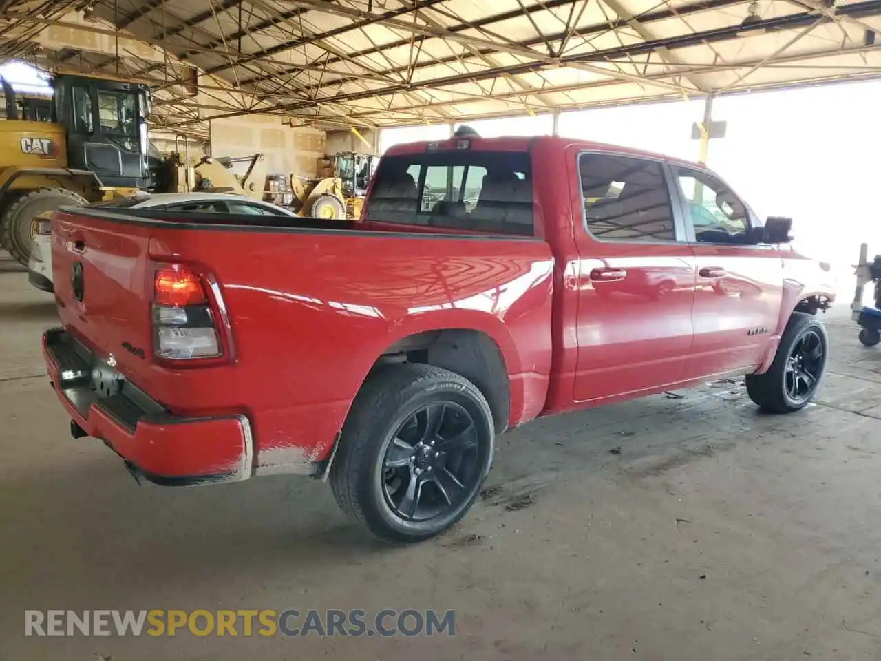 3 Photograph of a damaged car 1C6SRFFT1LN409819 RAM 1500 2020