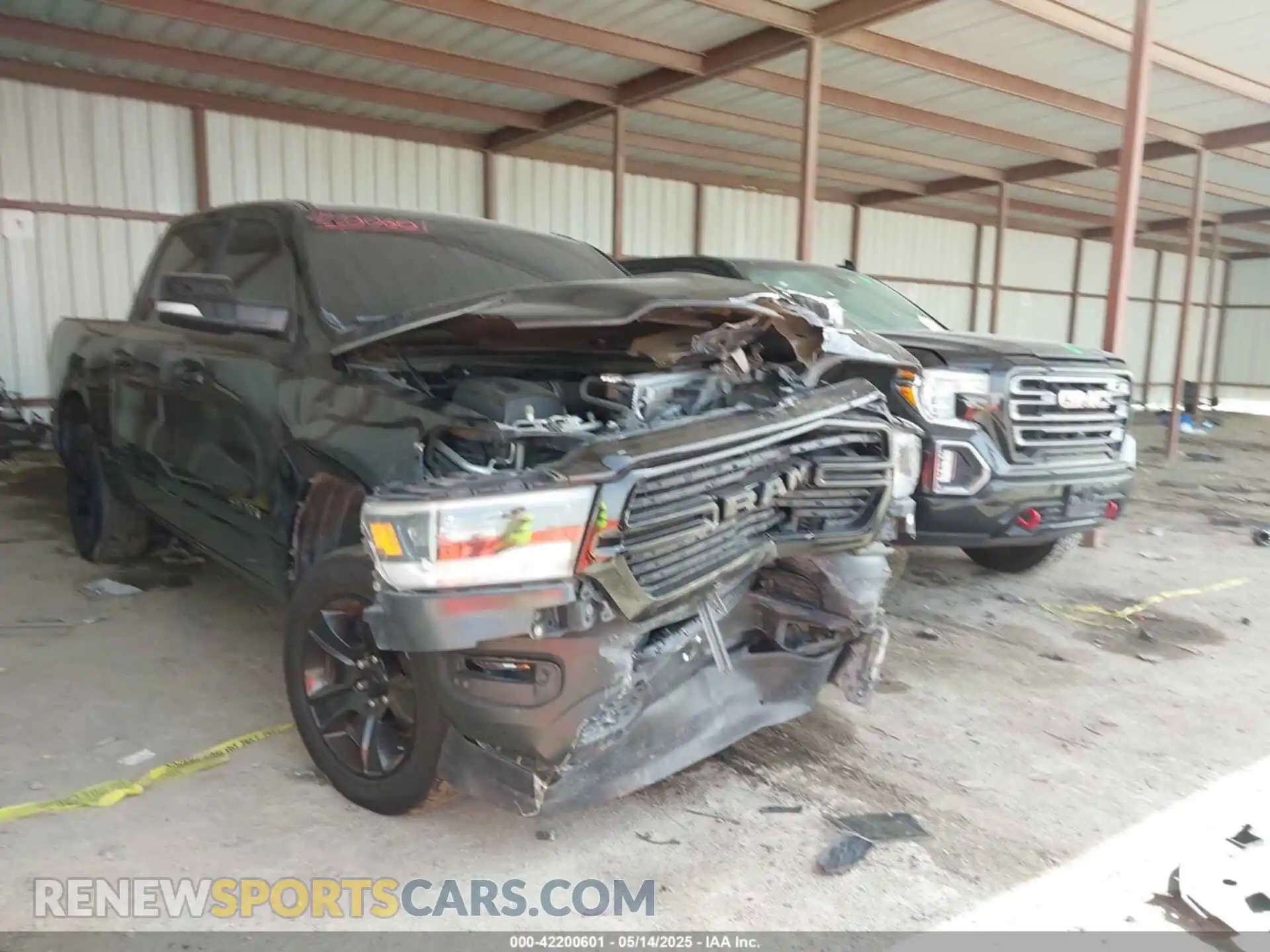 1 Photograph of a damaged car 1C6SRFFT2LN206860 RAM 1500 2020