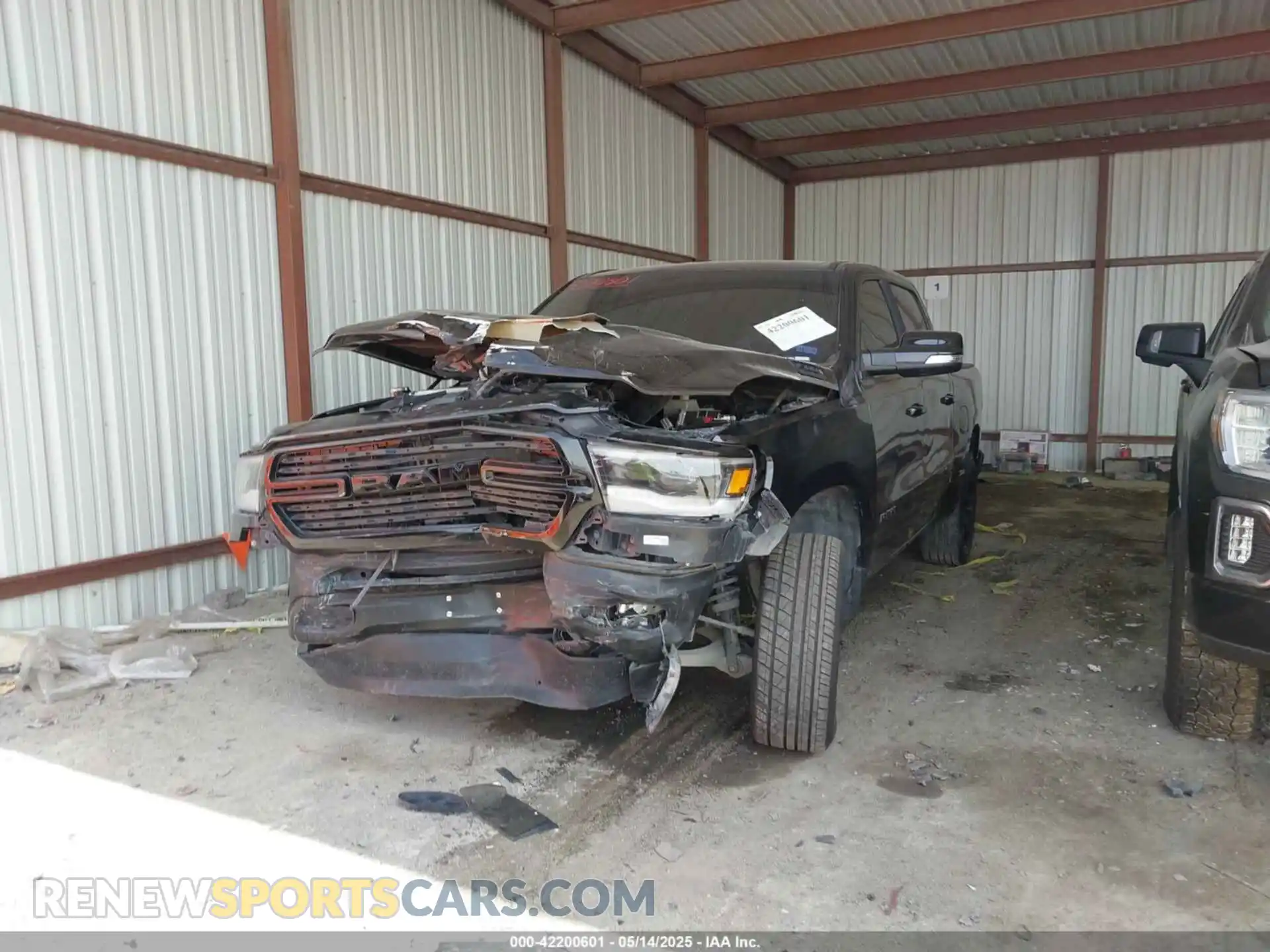 2 Photograph of a damaged car 1C6SRFFT2LN206860 RAM 1500 2020