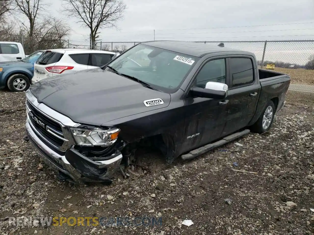 1 Photograph of a damaged car 1C6SRFFT2LN303749 RAM 1500 2020