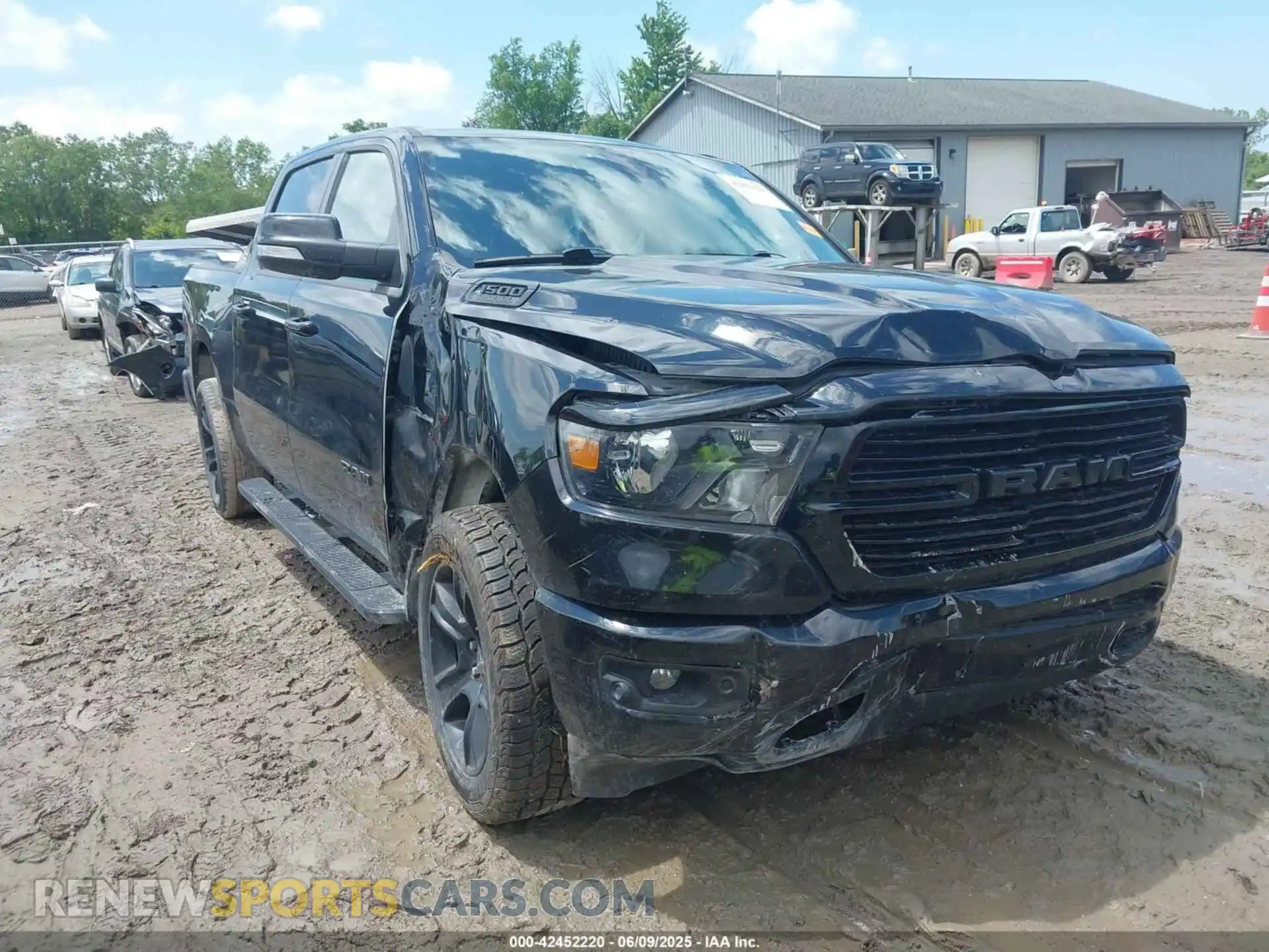 1 Photograph of a damaged car 1C6SRFFT3LN103124 RAM 1500 2020