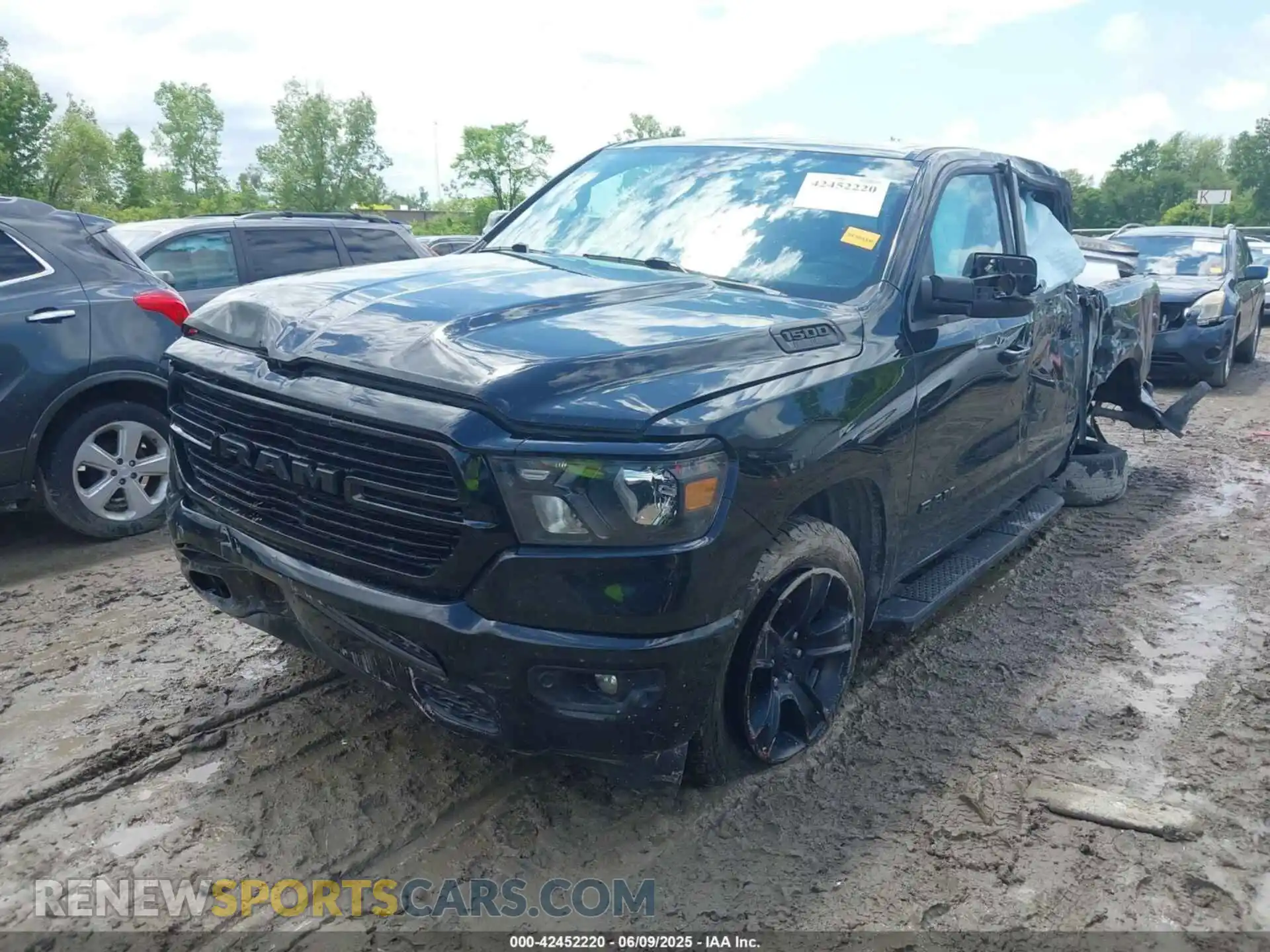 2 Photograph of a damaged car 1C6SRFFT3LN103124 RAM 1500 2020