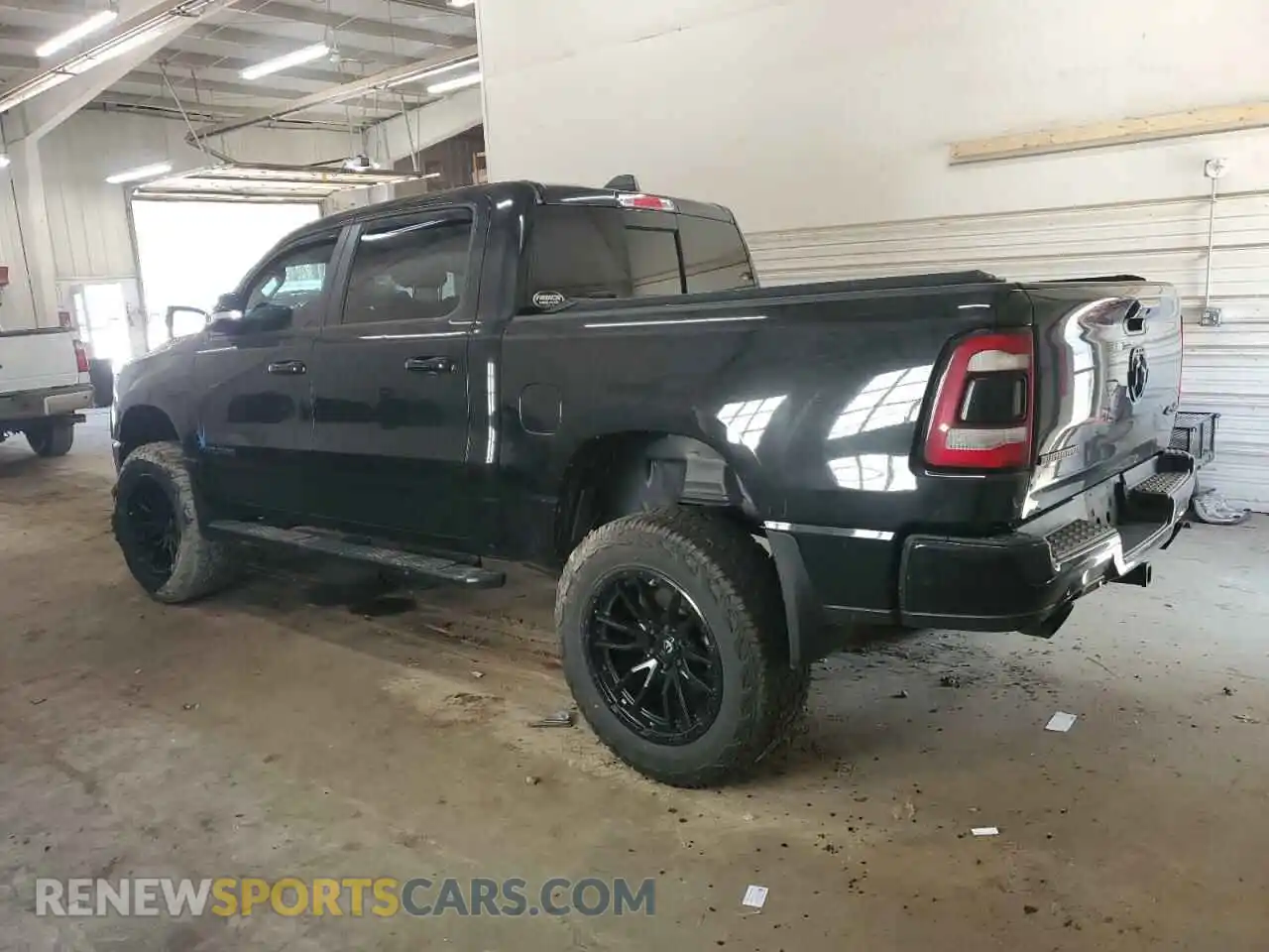 2 Photograph of a damaged car 1C6SRFFT3LN240631 RAM 1500 2020
