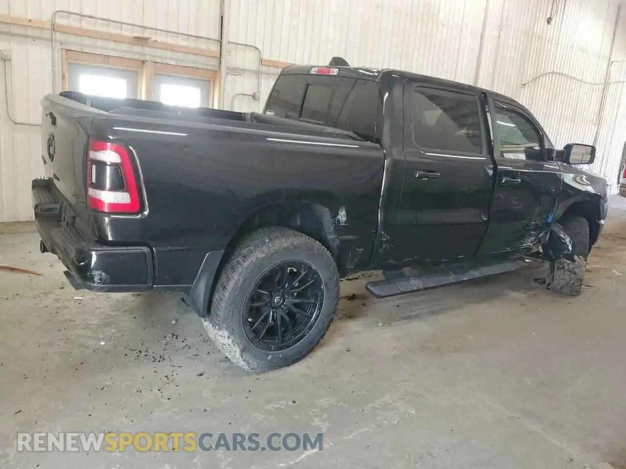 3 Photograph of a damaged car 1C6SRFFT3LN240631 RAM 1500 2020