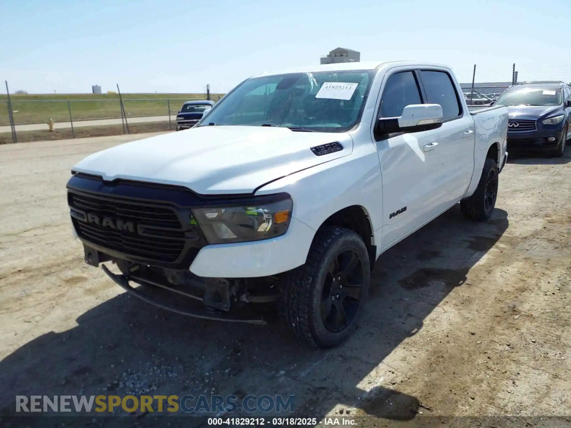 2 Photograph of a damaged car 1C6SRFFT3LN347291 RAM 1500 2020