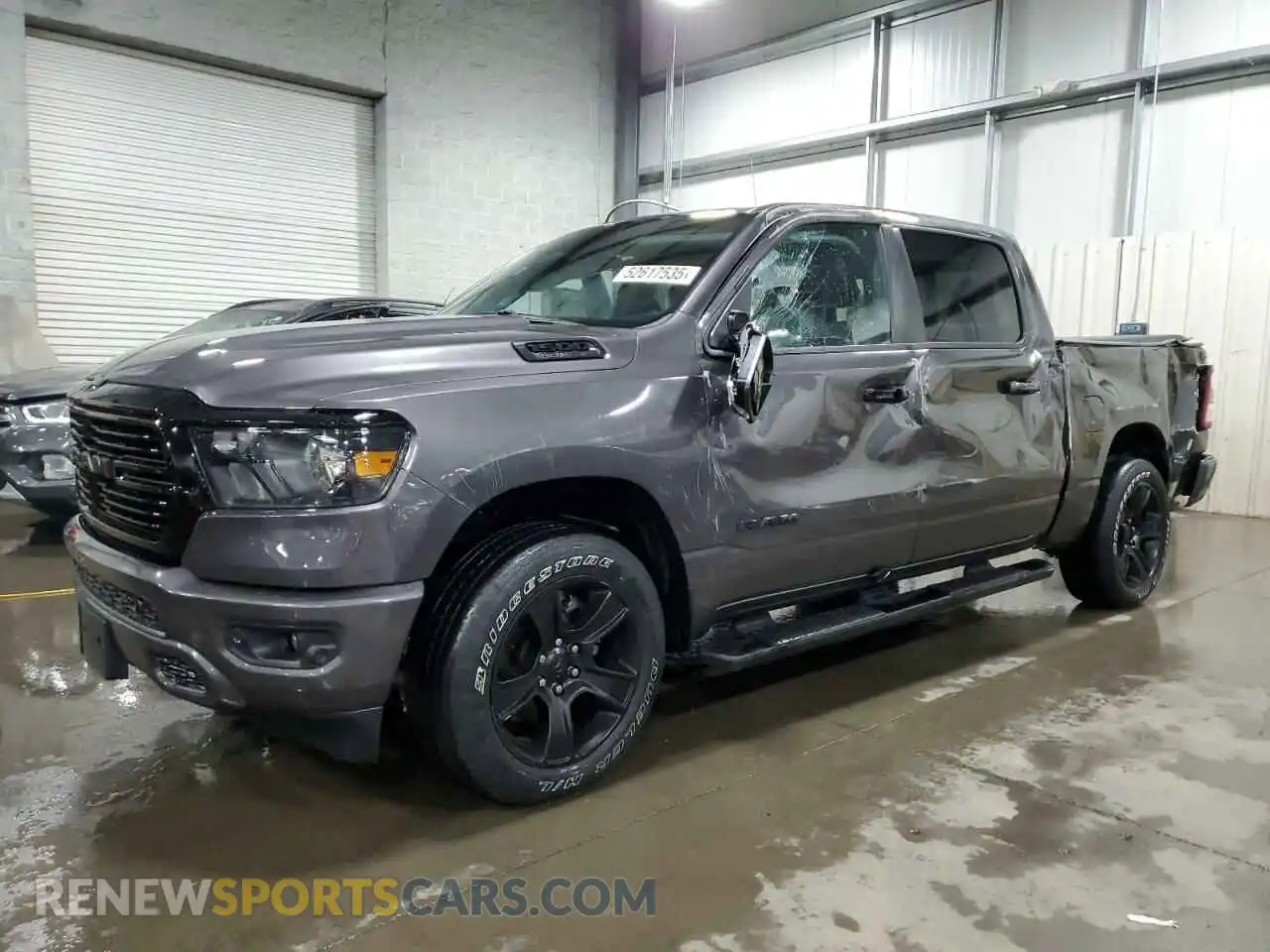 1 Photograph of a damaged car 1C6SRFFT3LN375902 RAM 1500 2020