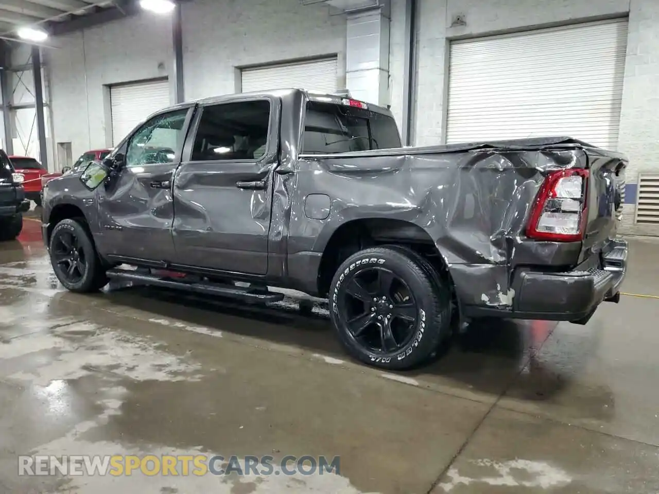 2 Photograph of a damaged car 1C6SRFFT3LN375902 RAM 1500 2020