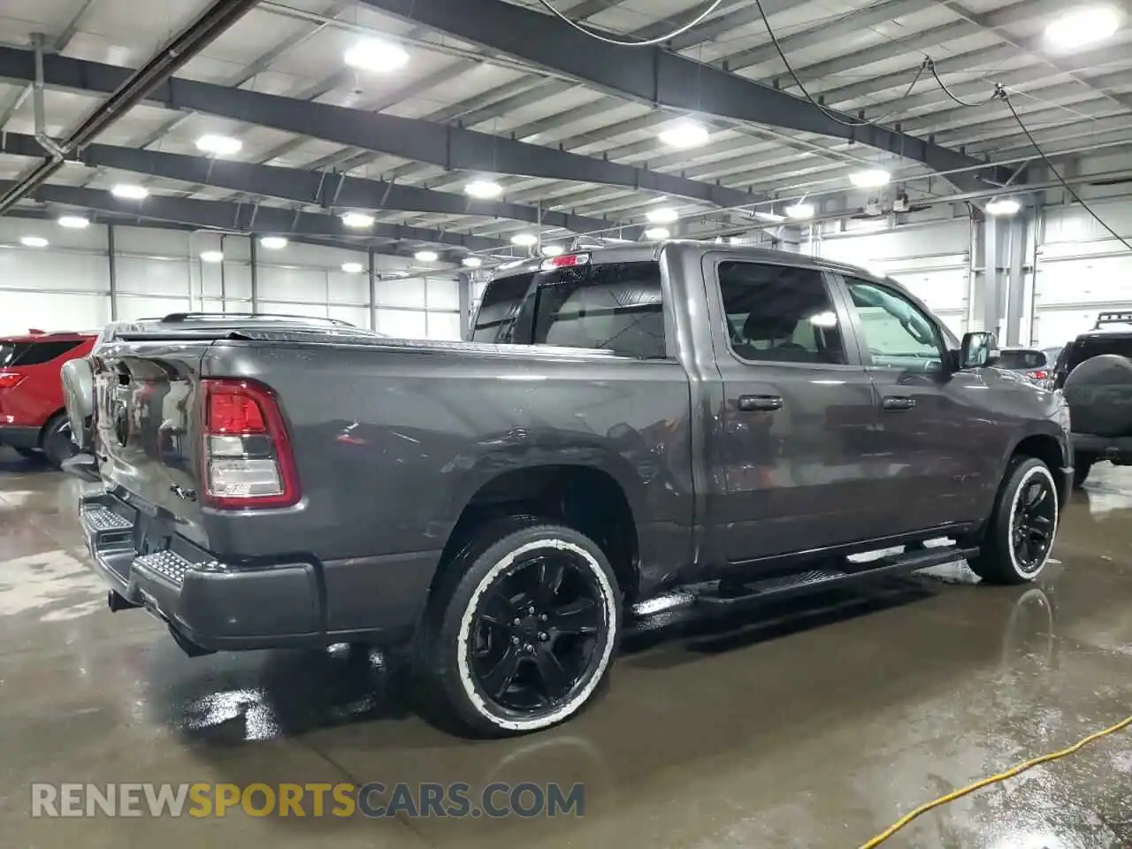 3 Photograph of a damaged car 1C6SRFFT3LN375902 RAM 1500 2020