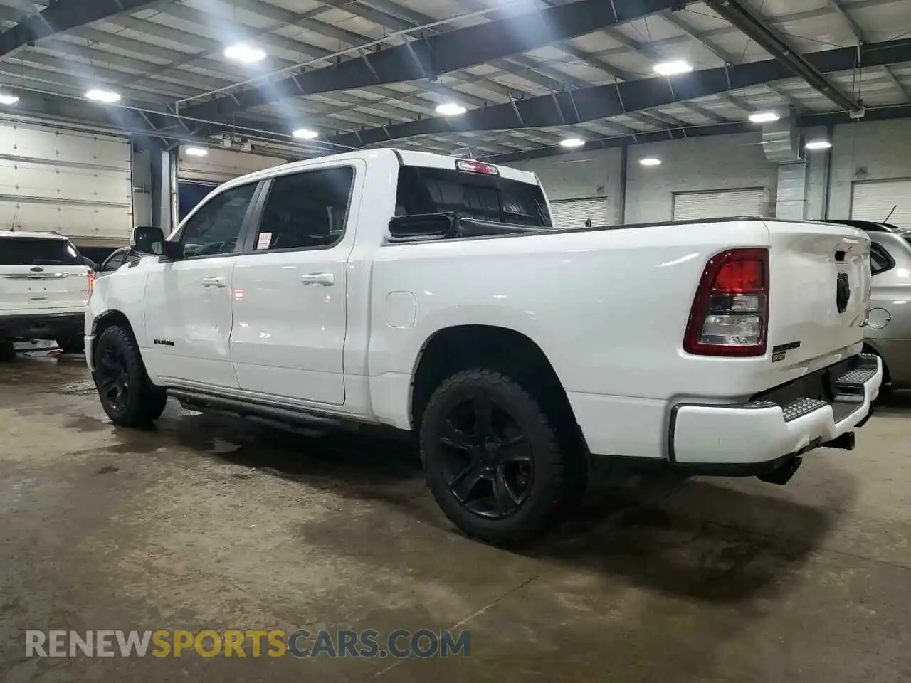 2 Photograph of a damaged car 1C6SRFFT3LN380467 RAM 1500 2020
