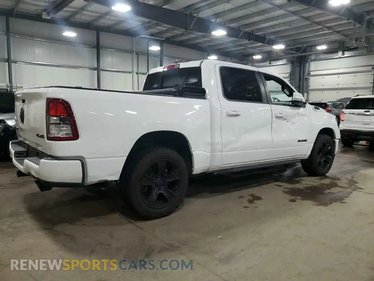 3 Photograph of a damaged car 1C6SRFFT3LN380467 RAM 1500 2020