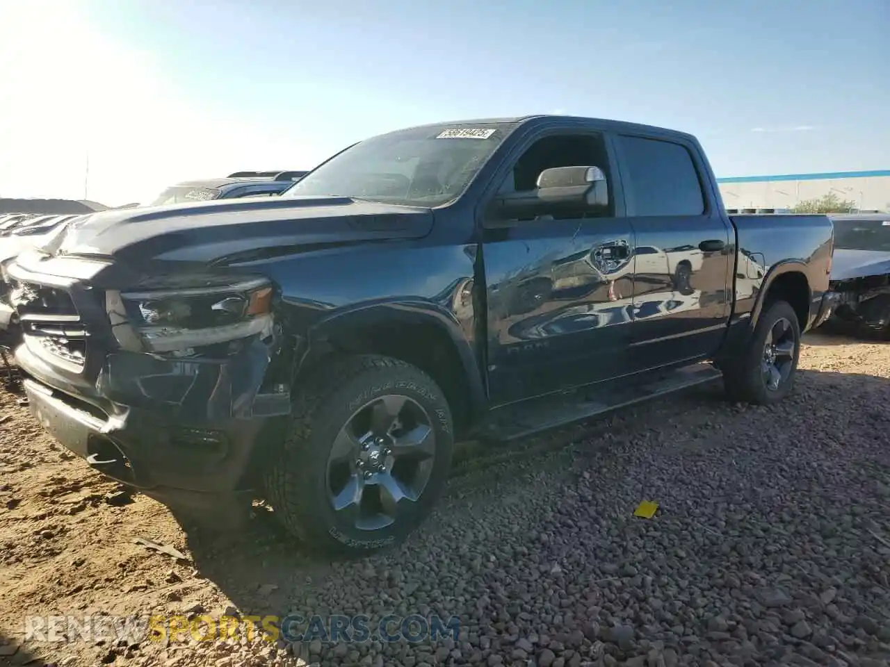 1 Photograph of a damaged car 1C6SRFFT3LN410700 RAM 1500 2020