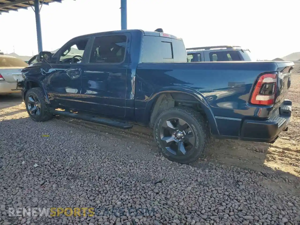 2 Photograph of a damaged car 1C6SRFFT3LN410700 RAM 1500 2020