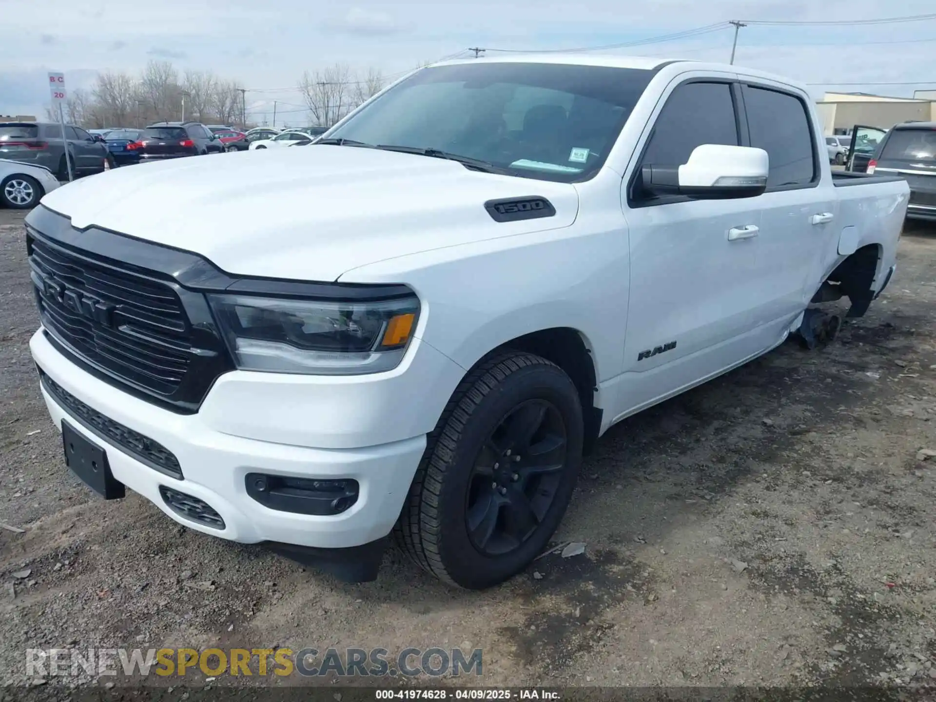 2 Photograph of a damaged car 1C6SRFFT5LN212426 RAM 1500 2020