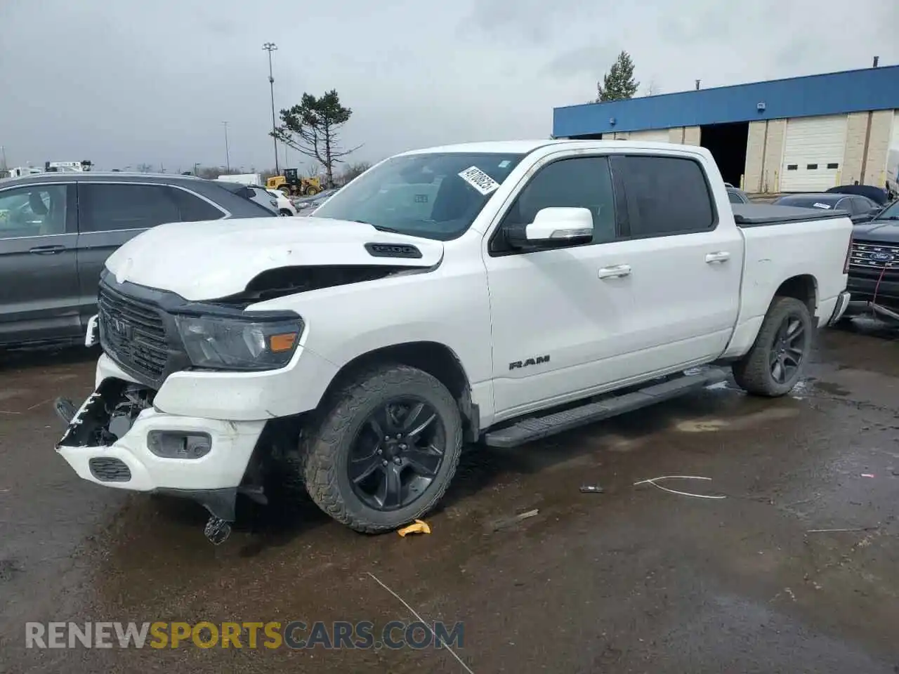 1 Photograph of a damaged car 1C6SRFFT5LN313904 RAM 1500 2020