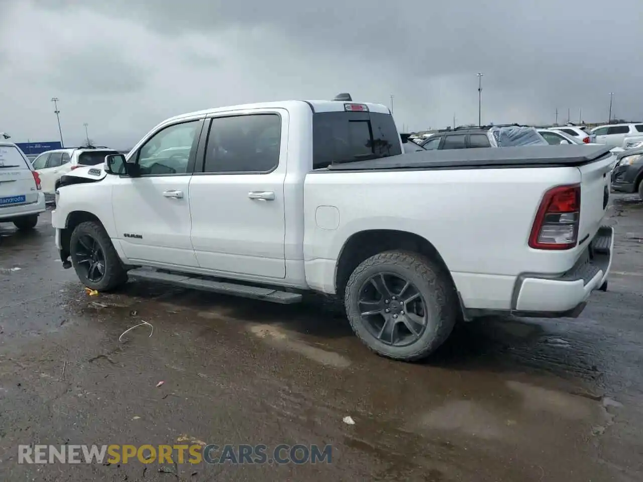 2 Photograph of a damaged car 1C6SRFFT5LN313904 RAM 1500 2020