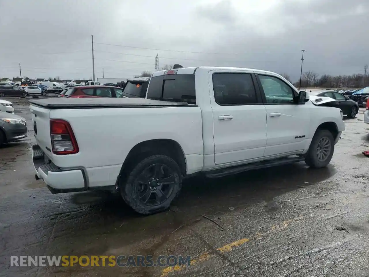 3 Photograph of a damaged car 1C6SRFFT5LN313904 RAM 1500 2020