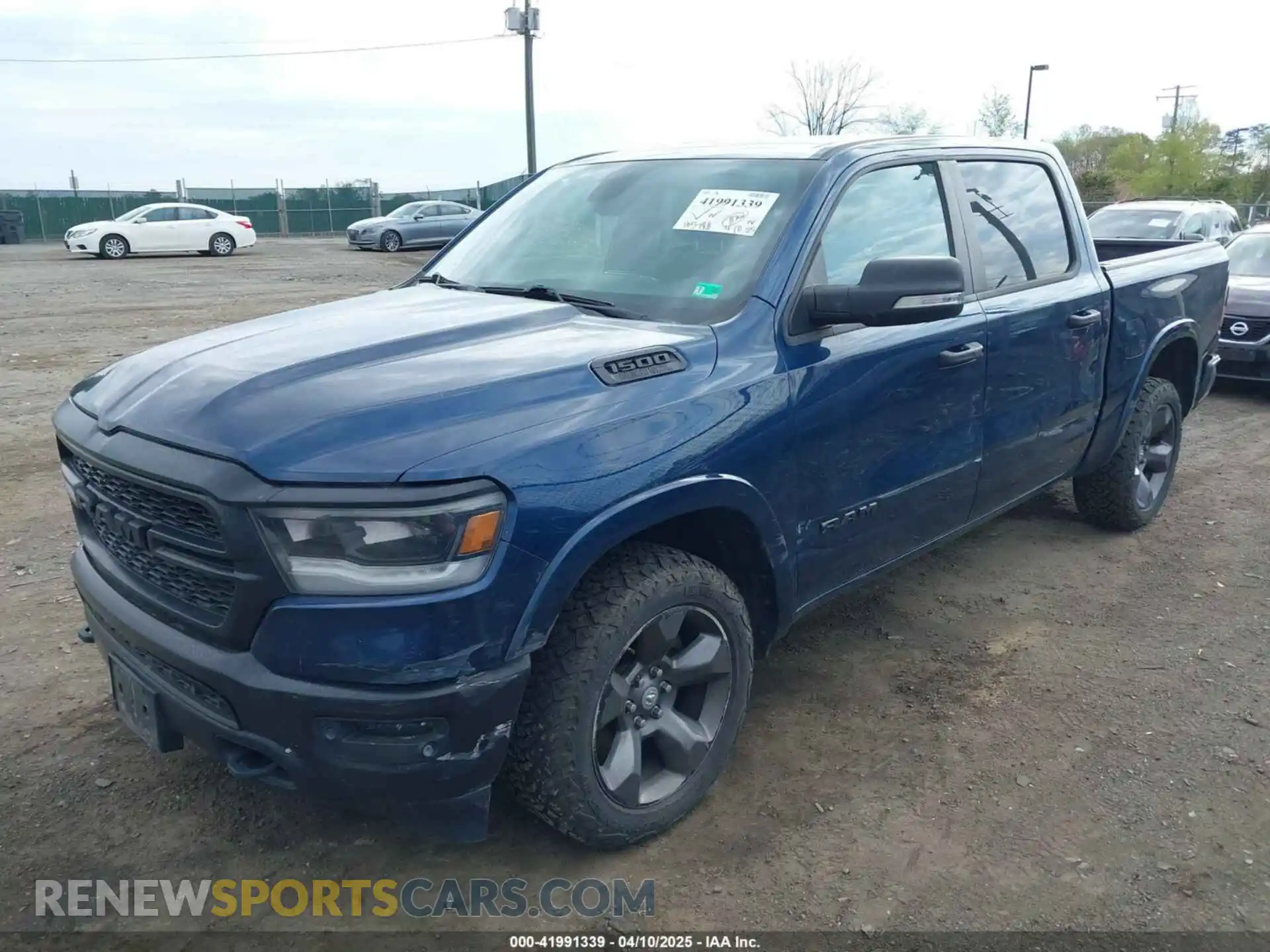 2 Photograph of a damaged car 1C6SRFFT5LN366666 RAM 1500 2020