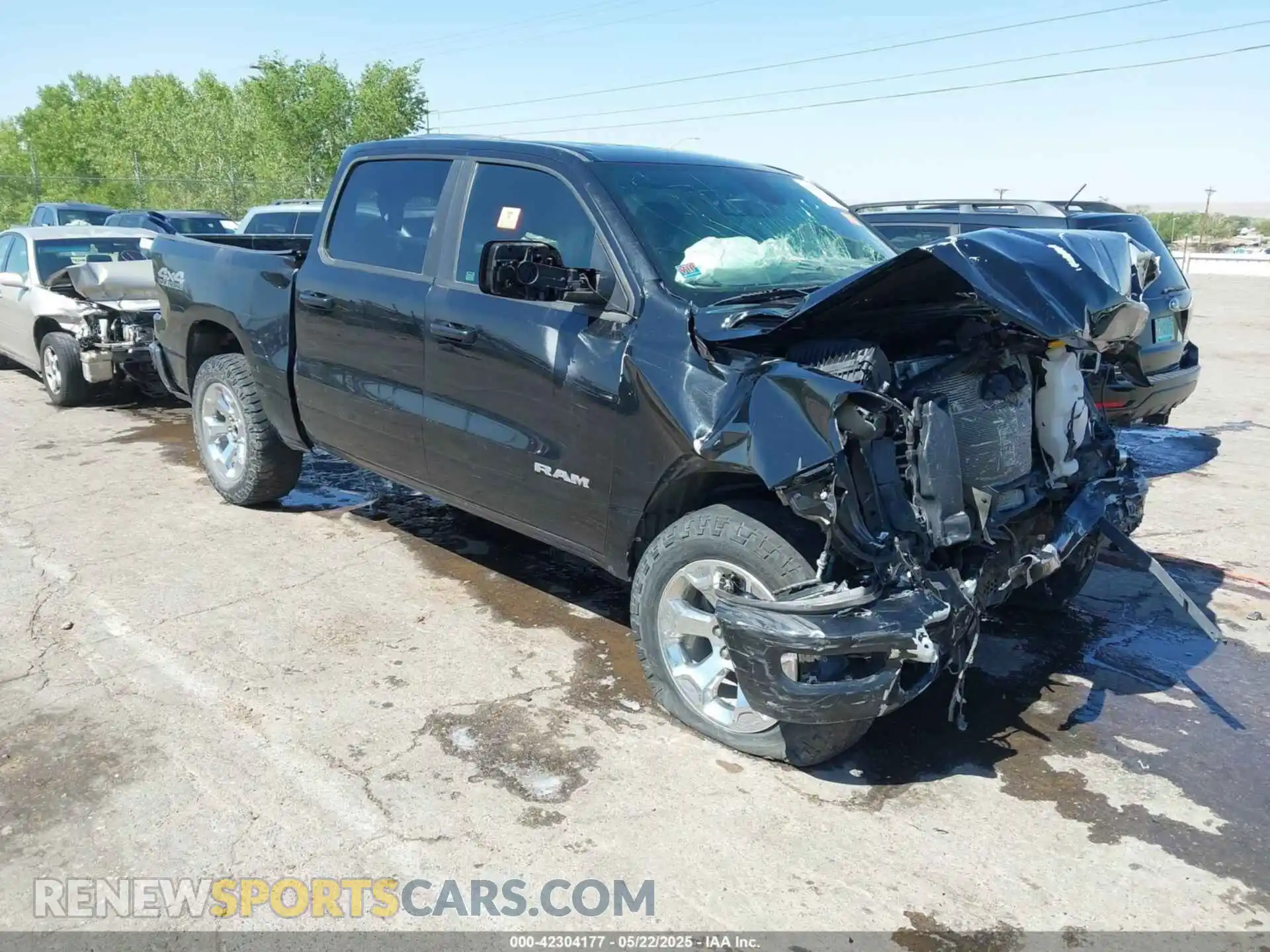 1 Photograph of a damaged car 1C6SRFFT6LN173474 RAM 1500 2020