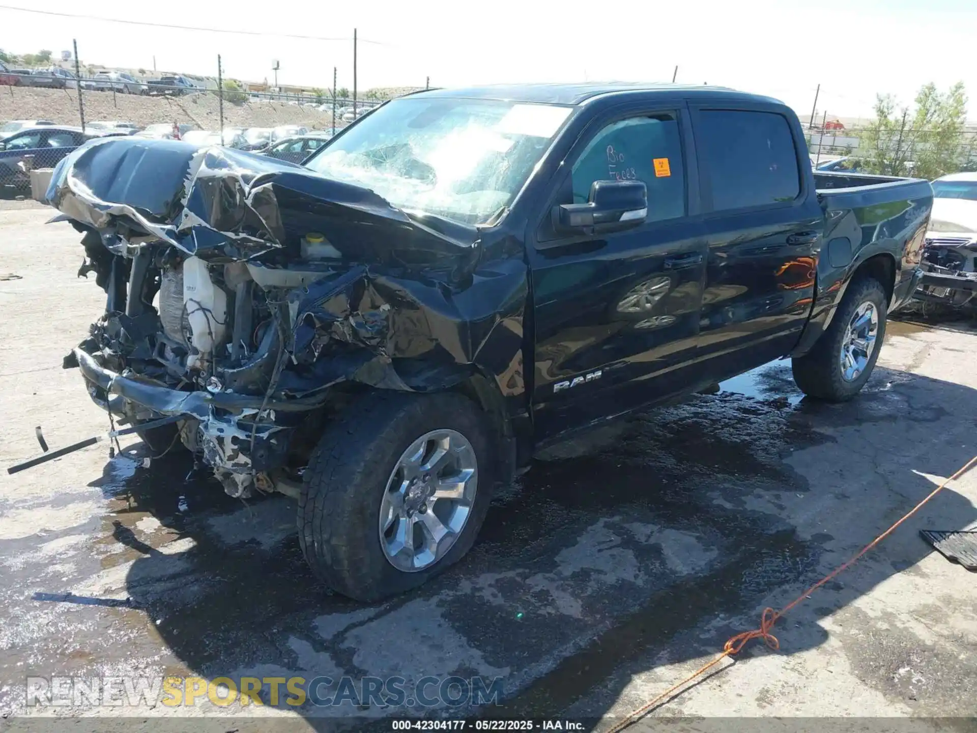 2 Photograph of a damaged car 1C6SRFFT6LN173474 RAM 1500 2020