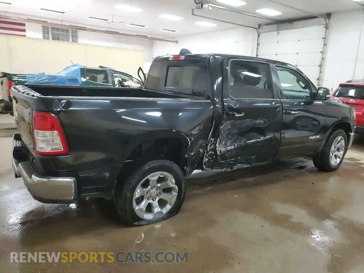 3 Photograph of a damaged car 1C6SRFFT6LN327102 RAM 1500 2020